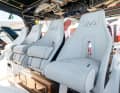 The shipyard installs four sports seats at the driving position.