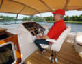 The driver is seated on an adjustable "Pörtner seat".