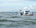 Sinking and salvage of the "Musta Kissa" off the Oste estuary.