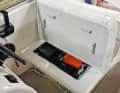 The storage space under the bench seat of our 24-foot Sea-Ray was originally separated by the cockpit table top