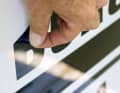 Carefully heat stickers, licence plates, lettering and name lettering with a hair dryer or heat gun and slowly peel them off, also removing any adhesive residue