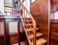 Below deck: Guests reach the day toilet and suites via a staircase
