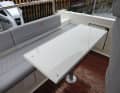 A sun lounger can be built with the table lowered and the seats folded out