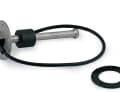 A stainless steel float switch. The float (black on the shaft) rises here