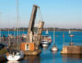 Pleasure craft pass the bascule bridge to the transverse canal