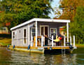 "Bungalow boat" on the Scharmützelsee. This type offers plenty of space and can also be steered without a licence