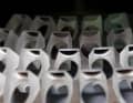 To minimise the amount of light reflected by the air-glass surfaces in the binoculars, the prisms and lenses are coated with various metallic compounds that are vapour-deposited in a special oven.