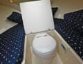 Toilet and bedroom: the toilet is located under the centre cushion of the comfortable bunk. There is a chemical toilet as standard, with a marine version available for an extra charge