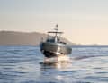 Silent and above the waves. The boat flies over the water with its wings