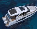 Wide side decks lead to the foredeck with a large sunbed.