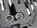 The recesses are deep and clamp the tool securely, but it is still easy to remove