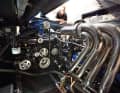 662 SCI COMP: With the blue paintwork, the aluminium belt pulleys and the polished stainless steel manifolds, the three Mercury Racing engines turn the engine compartment into a work of art. Thanks to the large cover, the mechanic can easily reach even the furthest corner