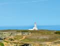 Wide view: the Poulains lighthouse in the north of Belle-Île