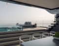 It is only a few steps from the dining area to the large pool.