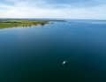Lots of blue: Our Gruno 37 Excellent on a southerly course near the western shore of the Müritz, with the Steinhorn peninsula to the rear left