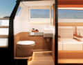 The toilet is also modern and functional.