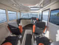 Bella 700 Raid: four seats in the deckhouse, access to the slip berth