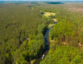 Die Vogelperspektive macht die nahezu grenzenlose Natur der Uckermark sichtbar: Wald- und Heidelandschaft erstrecken sich bis zum Horizont