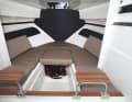 Pegazus 560 Top Fisher: seating area converts into a berth