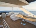 The driver finds a sports seat at the flybridge driving position and has a good view from up there