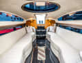 Below deck, porcelain flooring, leather sofas and bamboo wood create a cosy atmosphere. Large windows provide orientation