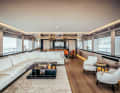 Wide lounge: cream-coloured ensemble of couch and armchairs by Flexform. The dining chairs with Foglizzo leather upholstery were made by the in-house joinery