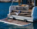 A hydraulically lowerable bathing platform.