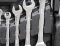 Moulded plastic recesses hold the tool well, but it is often difficult to remove