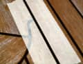 If an air pocket is found in the joint sealant during sanding, open it with a chisel, clean it and tape it off