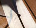 To repair, use a compatible material and apply generously so that the hole is filled completely