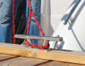 With a strong tug on the boat hook, the line slips out and the boat is held fast