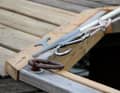 The smaller model sits somewhat loosely in a guide rail, and you have to be careful that the carabiner ...
