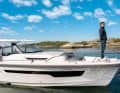 The designer on the bow of a Nimbus T-11 in the archipelago off his native Gothenburg