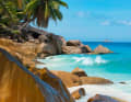 Pointe Cap Barbi in the north-west of La Digue with a view of Ave Maria Rock