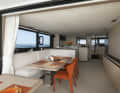 The living area of the trimaran has been cosily furnished