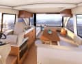 Made bright: very large windows and light-coloured materials in the saloon.
