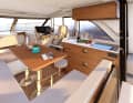 Saloon: Sitting area and galley can be opened to the outside.
