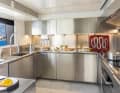 The stainless steel galley on board the 43 metre long Custom Line 140.