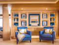 Two blue armchairs facing each other