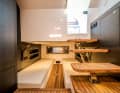 Single beds are located below deck - flat steps lead back to the deck after sleeping