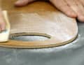 Intermediate sanding and UV protection: Allow the resin to harden, wash off and sand with 180 grit paper. Then remove the dust and apply three more coats using the wet-on-glue method. Then fine sand and seal with a 2K lacquer as UV protection