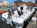 The Q50 Triple Motor. The boat is powered by three Volvo Penta D6-440 engines. The Ullman jockey seats cannot be overlooked here either