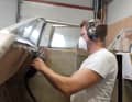 The cut surfaces are smoothed with an angle grinder and final corrections are made