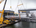 Now half of Heesen is fully in the straps.