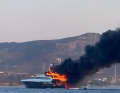 Column of smoke off the Sardinian coast