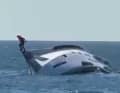 The owner, captain and two crew members jumped from the ship, all of whom were rescued.