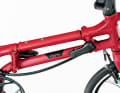 The frame consists of two tubes and is folded in opposite directions with two hinges
