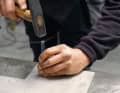 A targeted centre punch prevents the drill bit from slipping when drilling in stainless steel