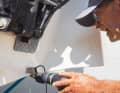 Attach the transducer briefly, align and drill the screw holes to size