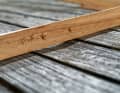 The batten clearly shows how differently the wood has weathered and washed out from decades of scrubbing. The epoxy resin would form lakes in these valleys, so they have to be levelled out